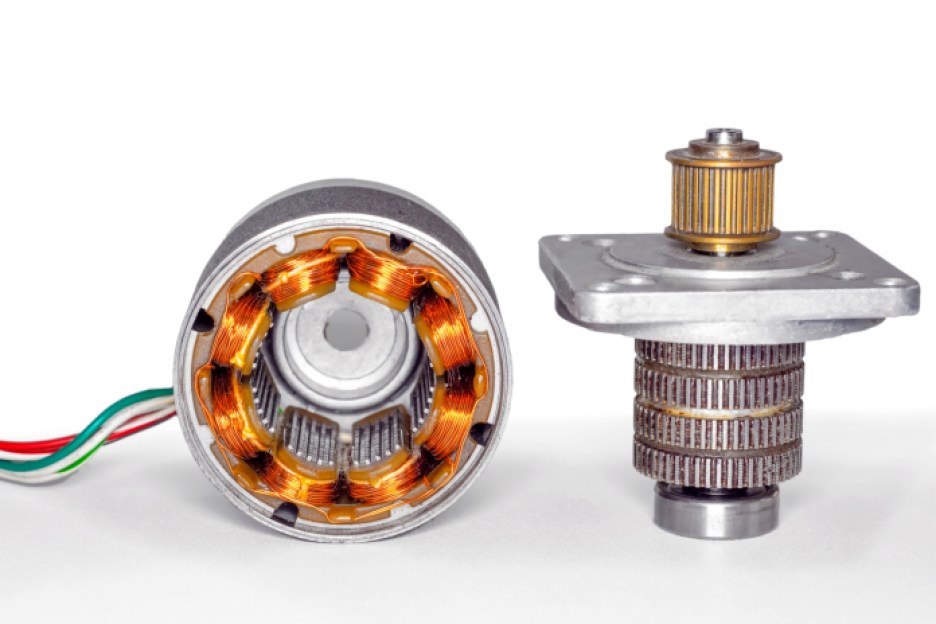 Stepper motor disassembled, with stator on the left and rotor on the right.