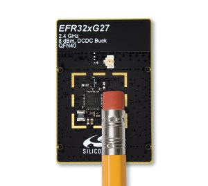 Size comparison of Silicon Labs Silicon Labs XG27 SoC next to pencil.