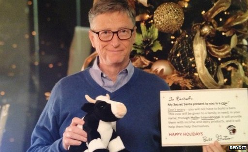 Bill Gates with a stuffed cow