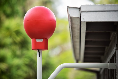 A custom-designed Internet antenna attached to a user's house allows the homeowner to receive Internet service from Project Loon