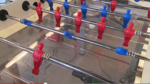 Robot plays foosball 01