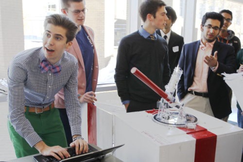 Students using confectionary cannon