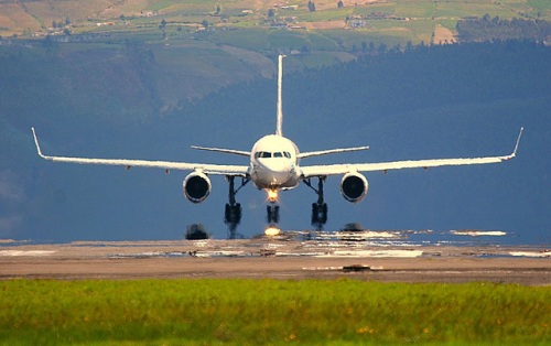 A plane taxiing the runway