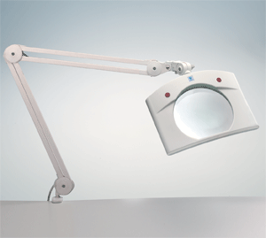 Inspection lamp accepts different magnifiers