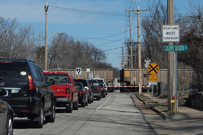 Car at railroad crossing