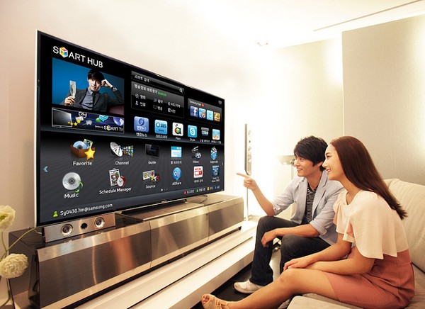 People in front of Samsung SmartTV