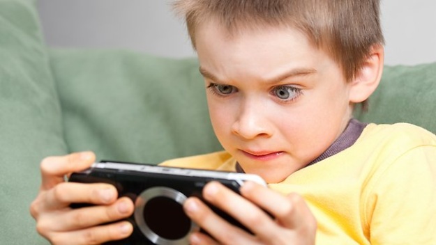 Child playing game on phone