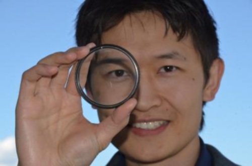 Kenneth Chau with spray on lens material