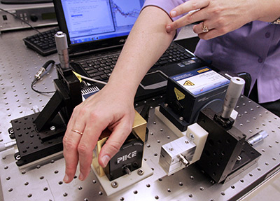 Close-up of laser glucose test