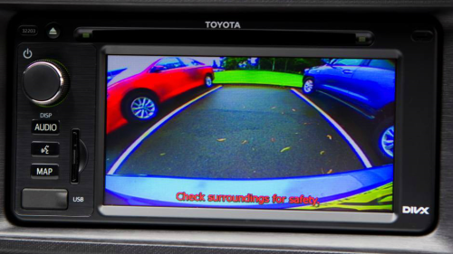 A car screen that shows what objects are behind when backing up.