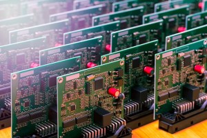 Shutterstock image of group of PCBs lined up in rows.