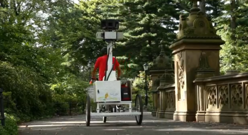 Google Street View team member takes the recording technology along one of Central Park’s bike paths.